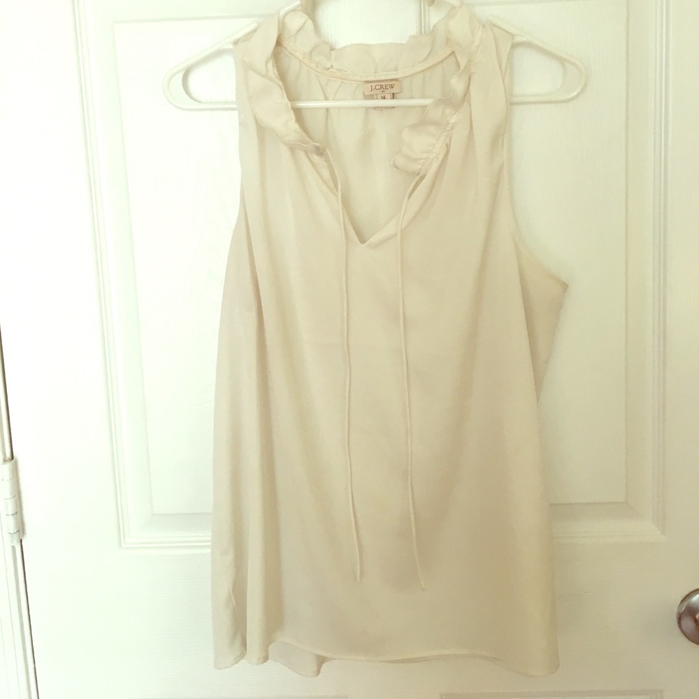 Cream colored sleeveless blouse - perfect to layer
