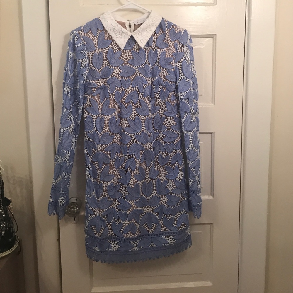 White collar dress with embroidered purple overlay