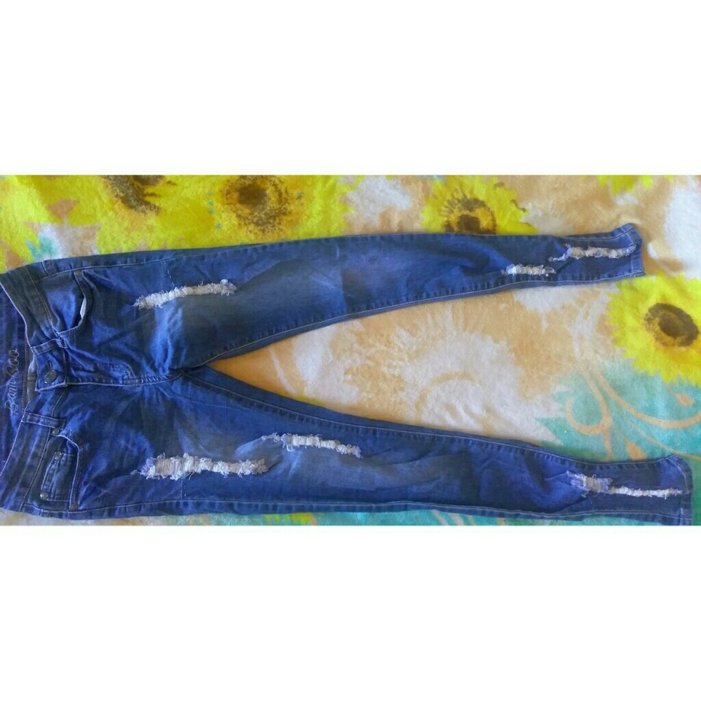 Distressed Blue Wash Jeans.