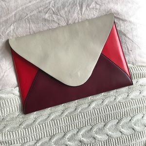 BCBG Leather multi-tone clutch