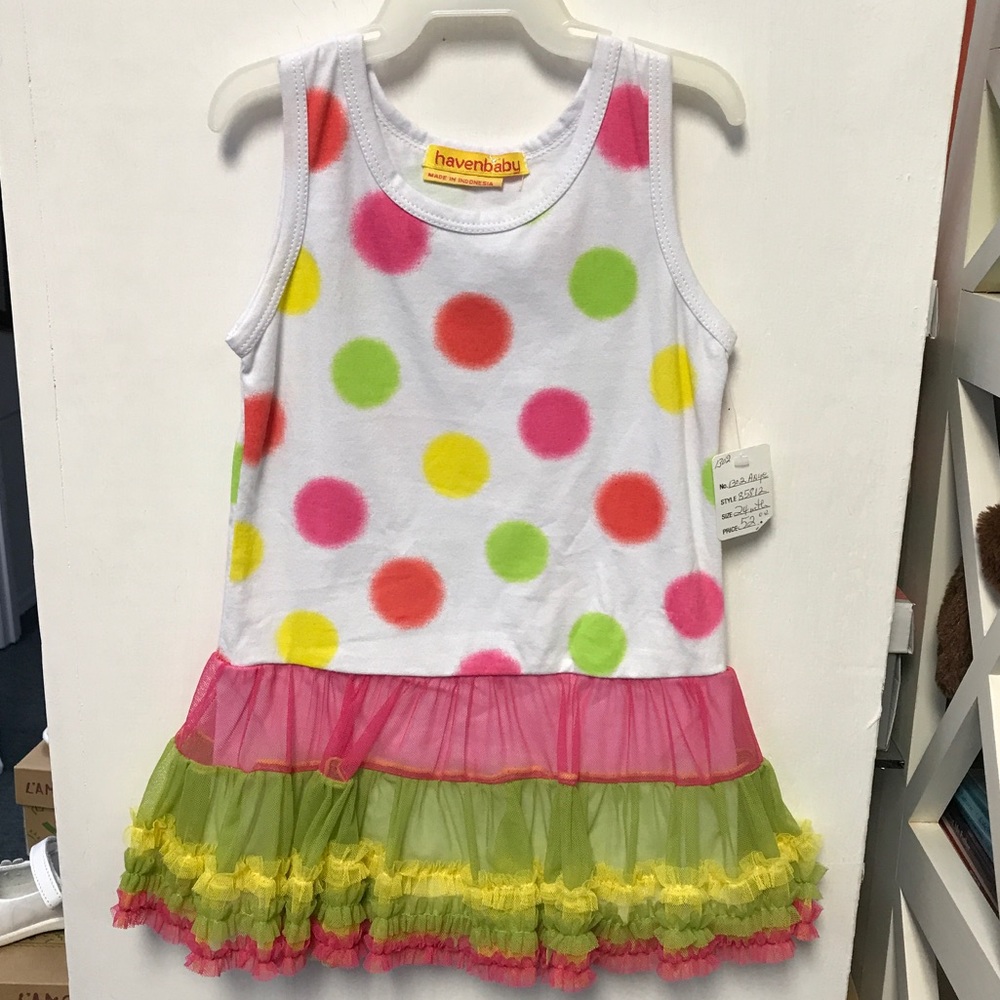 One piece outfit with a tulle skirt and polka dots