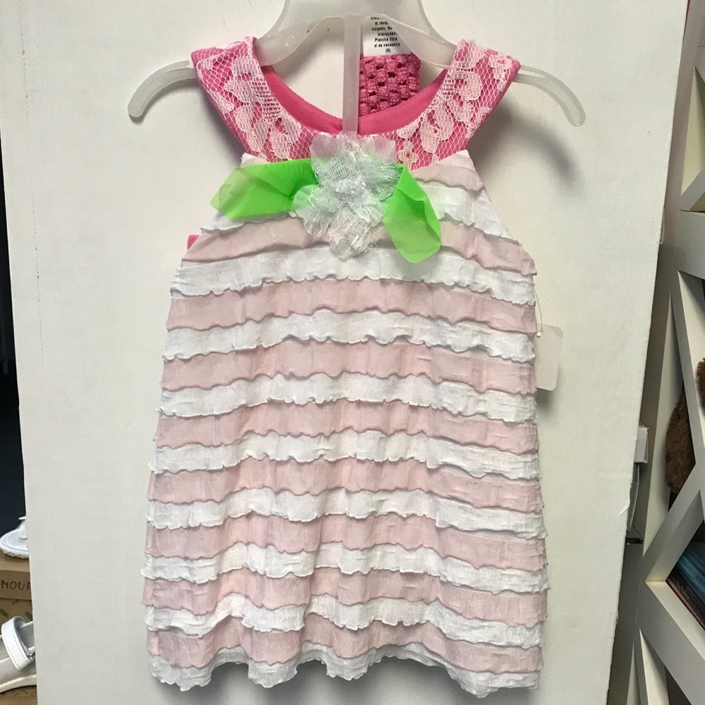 Two piece outfit with pink shorts and a a headband