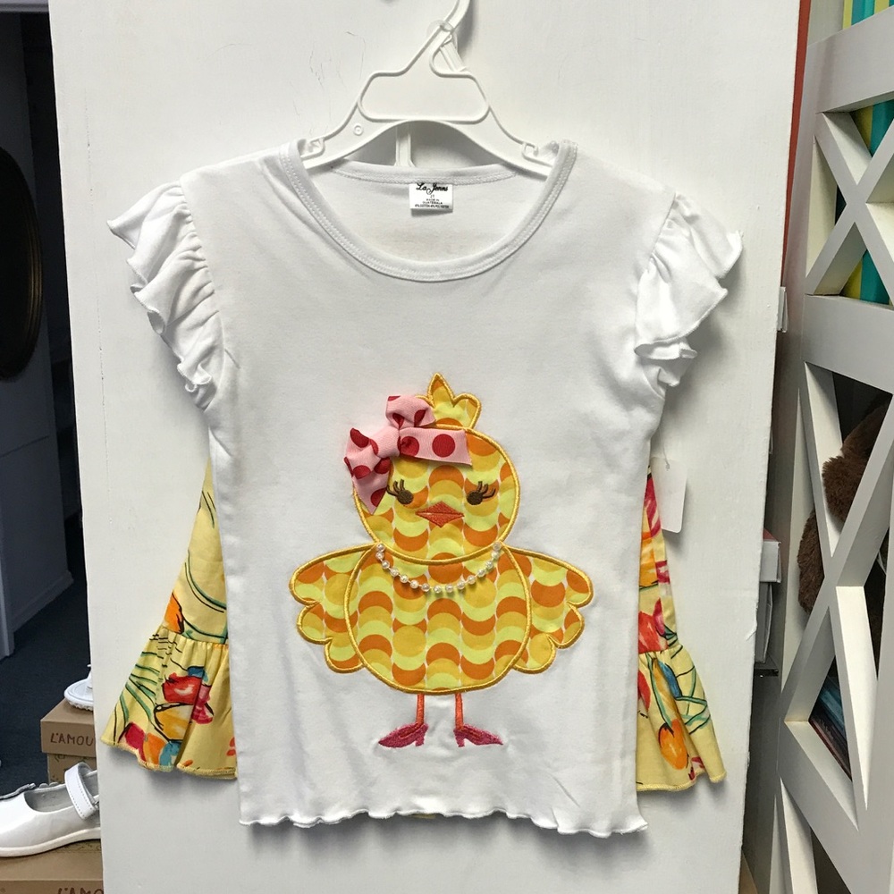 2 piece outfit with top and yellow flowery skirt