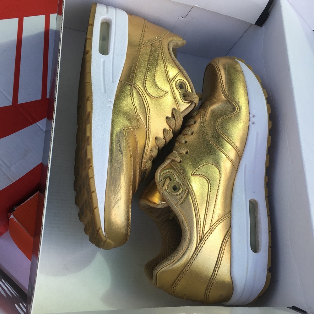 Gold metallic Nike ar max