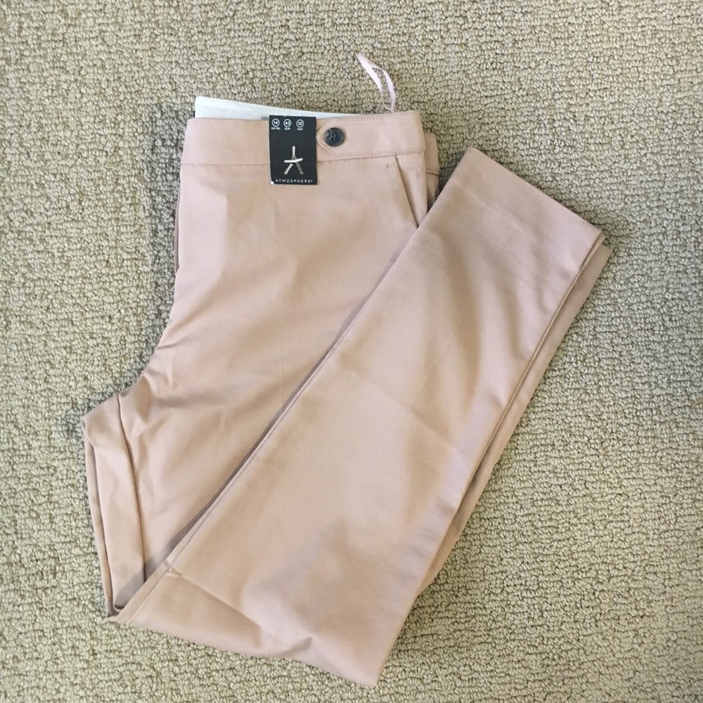 Beige skinny pants.