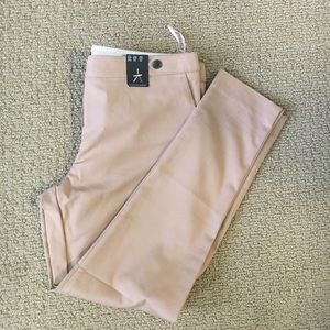Beige skinny pants.