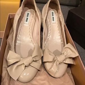 MiuMiu iconic crystal heel ballet shoe