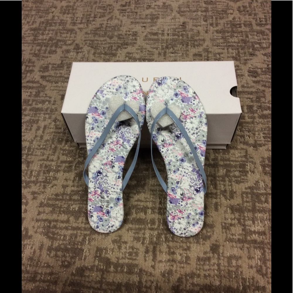New with box of lauren Conrad floral flip flops