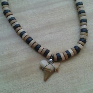 Vintage sharks tooth on a wooden necklace