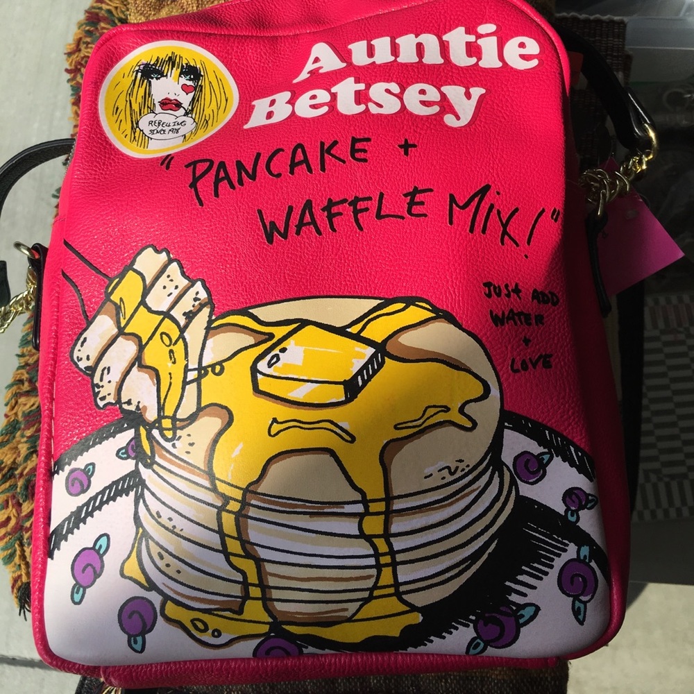 Pink pancake Betsy Johnson crossbody bag