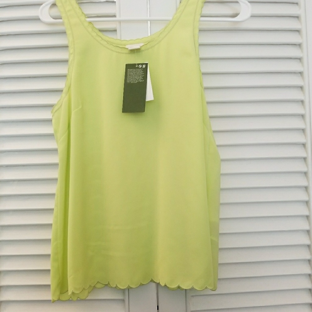Light green sleeveless shirt