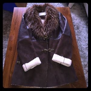 Bomber leather coat with faux fur trim