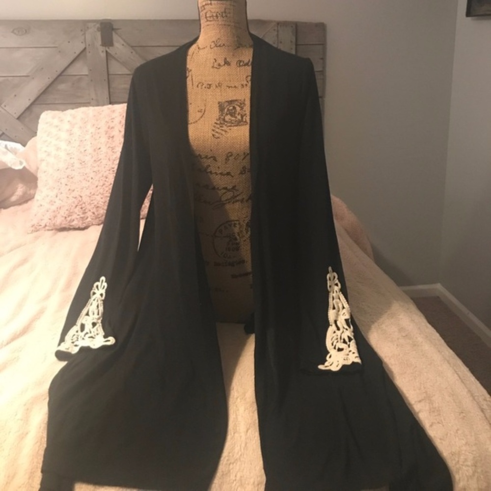 Black with White embroidered like sleeves EUC Larg