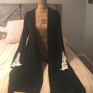 Black with White embroidered like sleeves EUC Larg