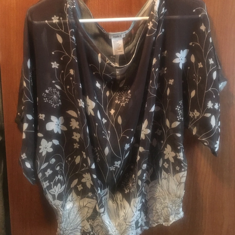 Beautiful brown/cream blouse with flowy sleeves.