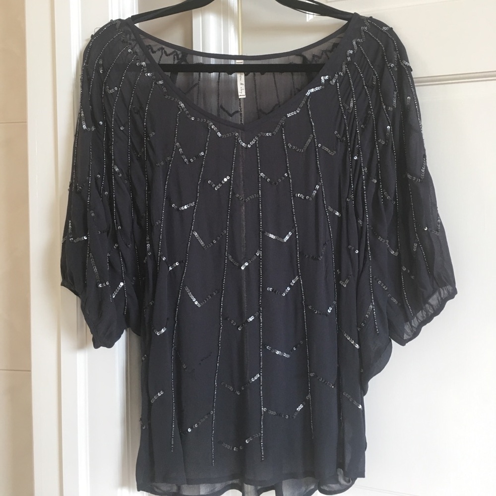 Sheer beaded blouse