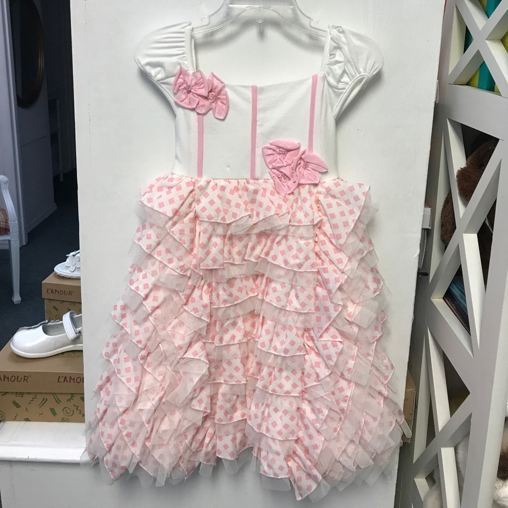 Pink and white dress with a ruffle skirt