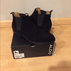 ALDO Chelsea style black suede boots.