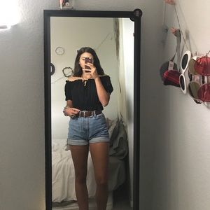 Black ruffled over the shoulder top