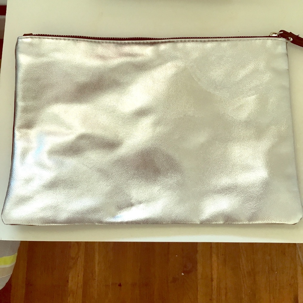 Women's silver and black purse