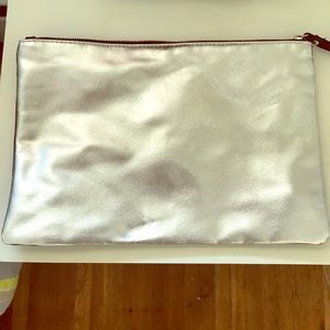 Women's silver and black purse