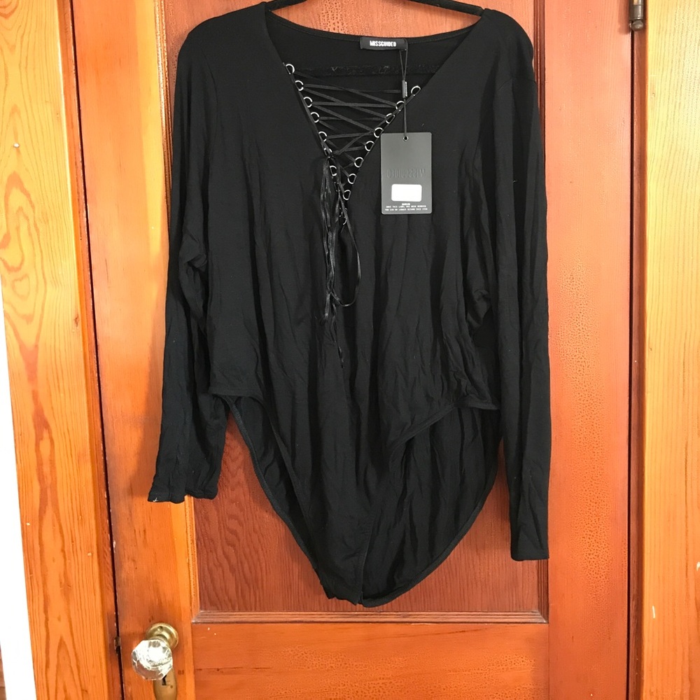 Black lace up leotard.