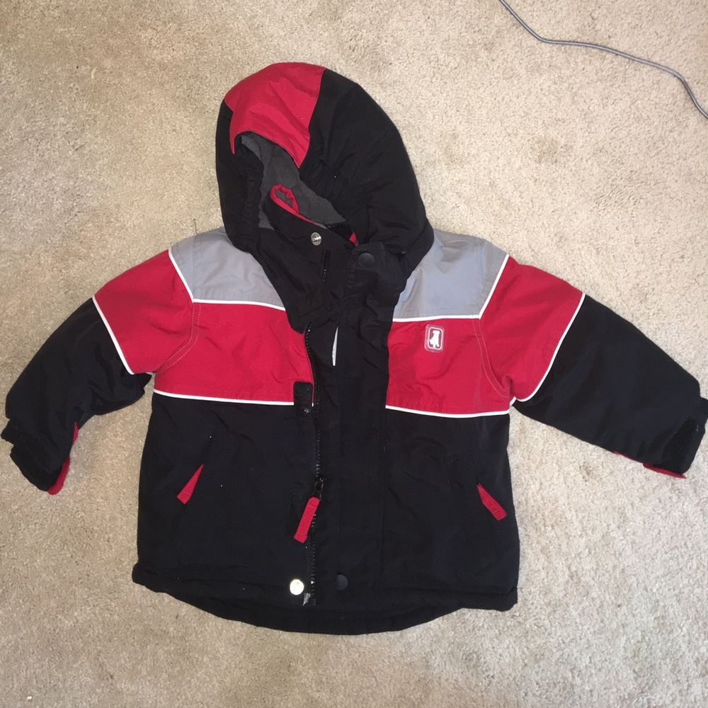 Never worn boys winter coat with removable hood