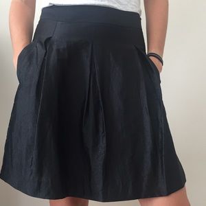 BCBG fancy, flattering black pleated skirt