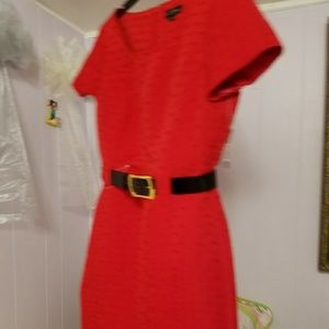 Cute new red dress, with black belt size 10