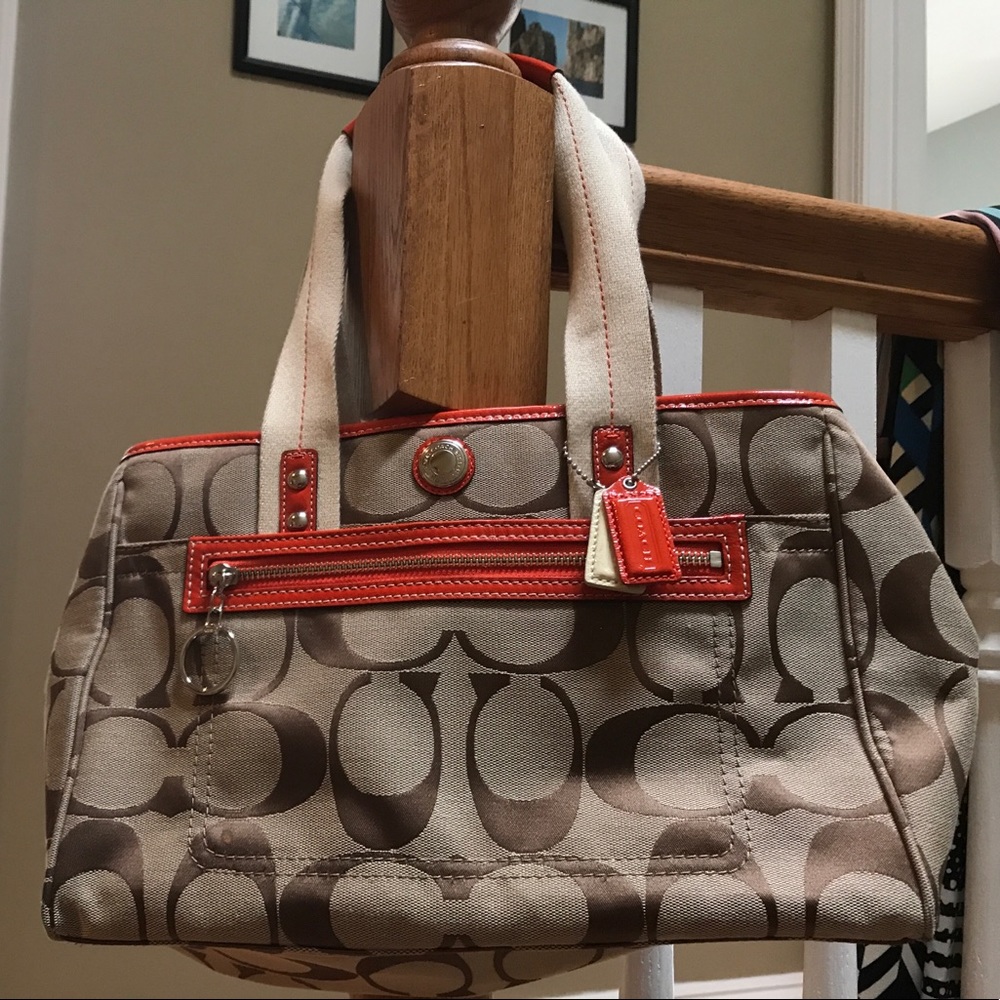 Coach brown purse with orange piping like new