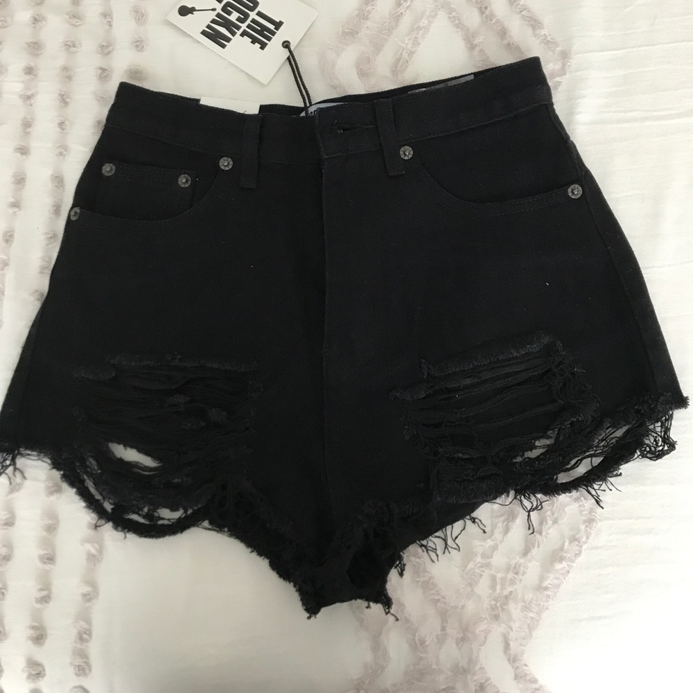 High waisted black distressed shorts