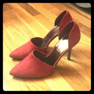 Red suede pumps