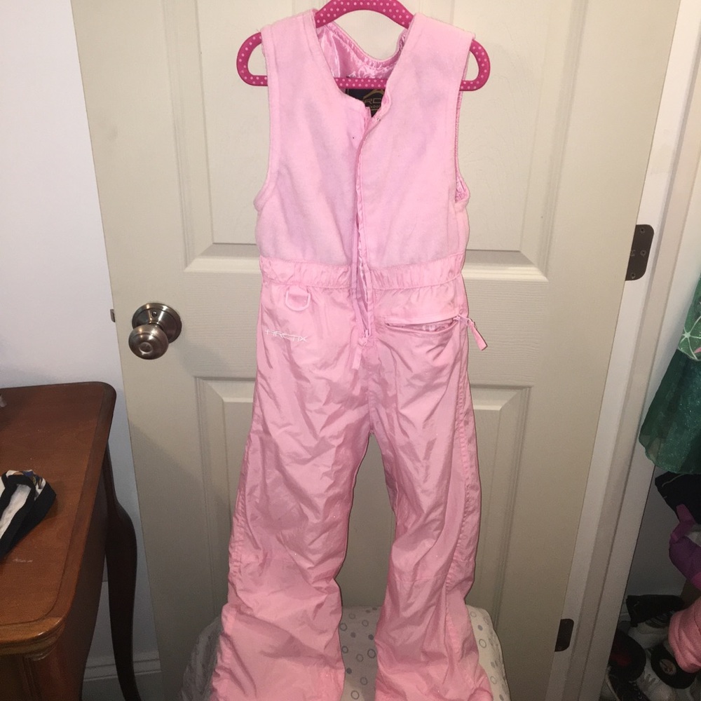 Pink snow pants.