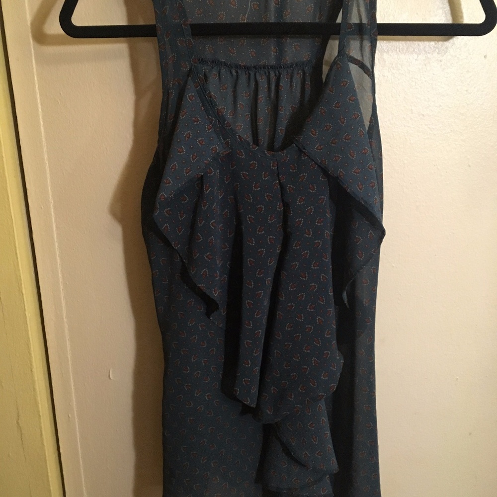 Sleeveless blouse with ruffled front