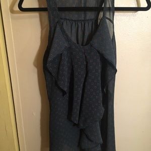 Sleeveless blouse with ruffled front