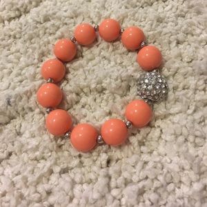 Coral beaded bracelet w/ silver rhinestone bead