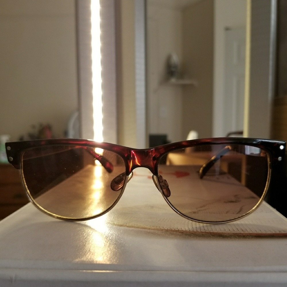 Women's gold and brown sunglasses