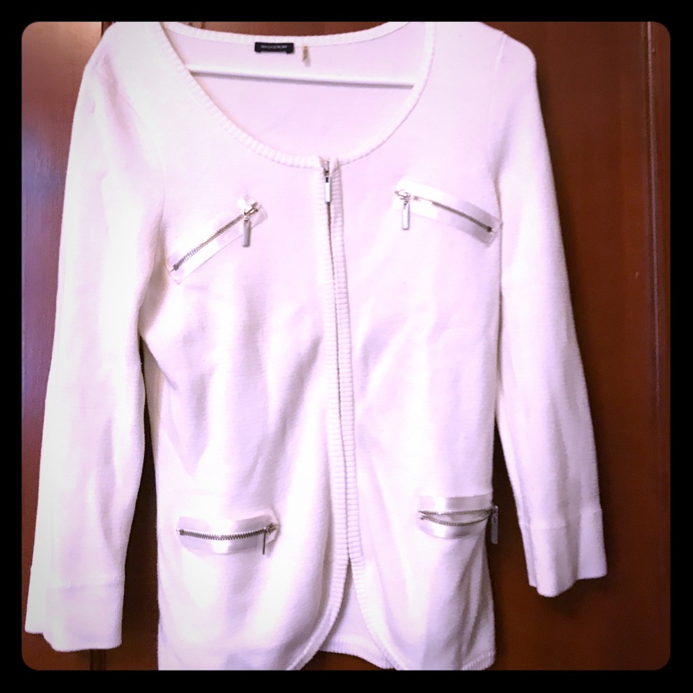 White cardigan from Magaschoni.