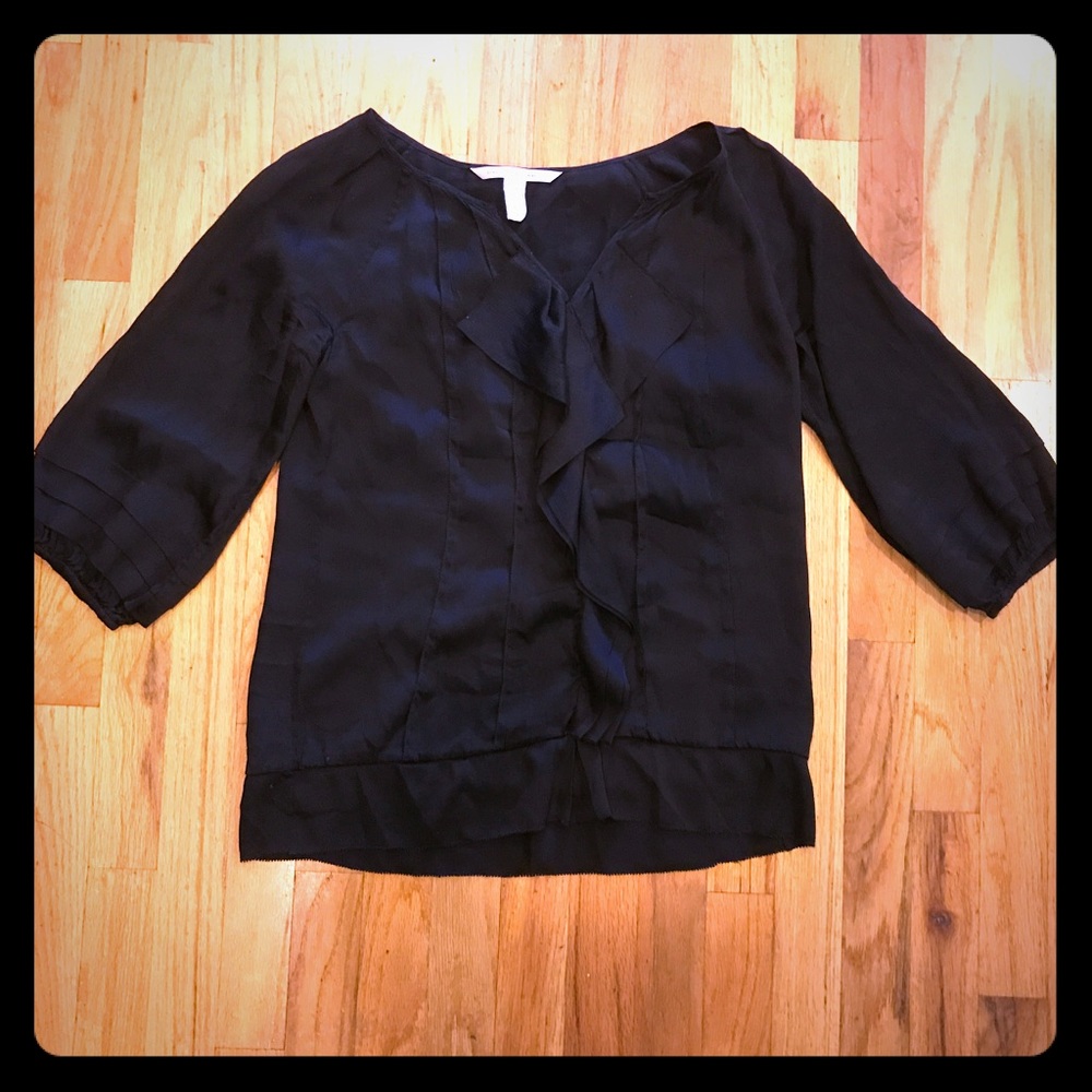 DVF black silk blouse in size 8.