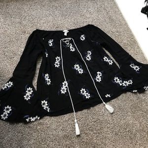 Bell sleeve lace up blouse