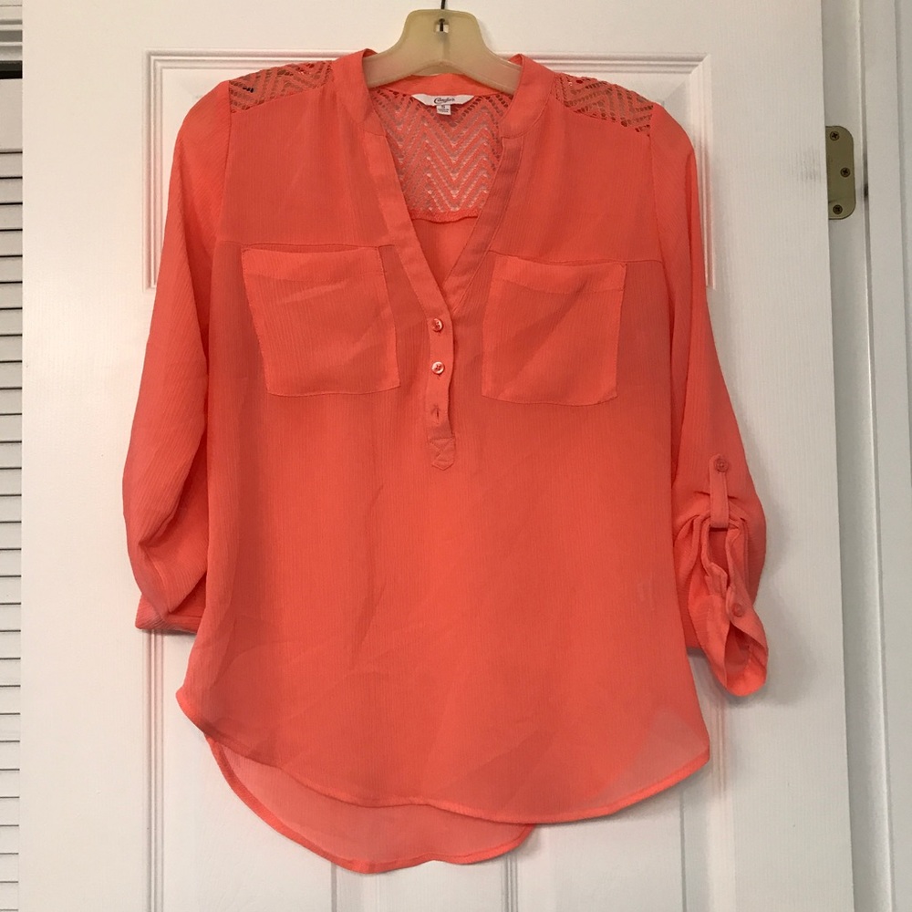 Peach top with lace on the back