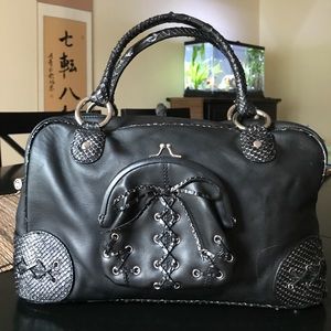Black faux leather handbag
