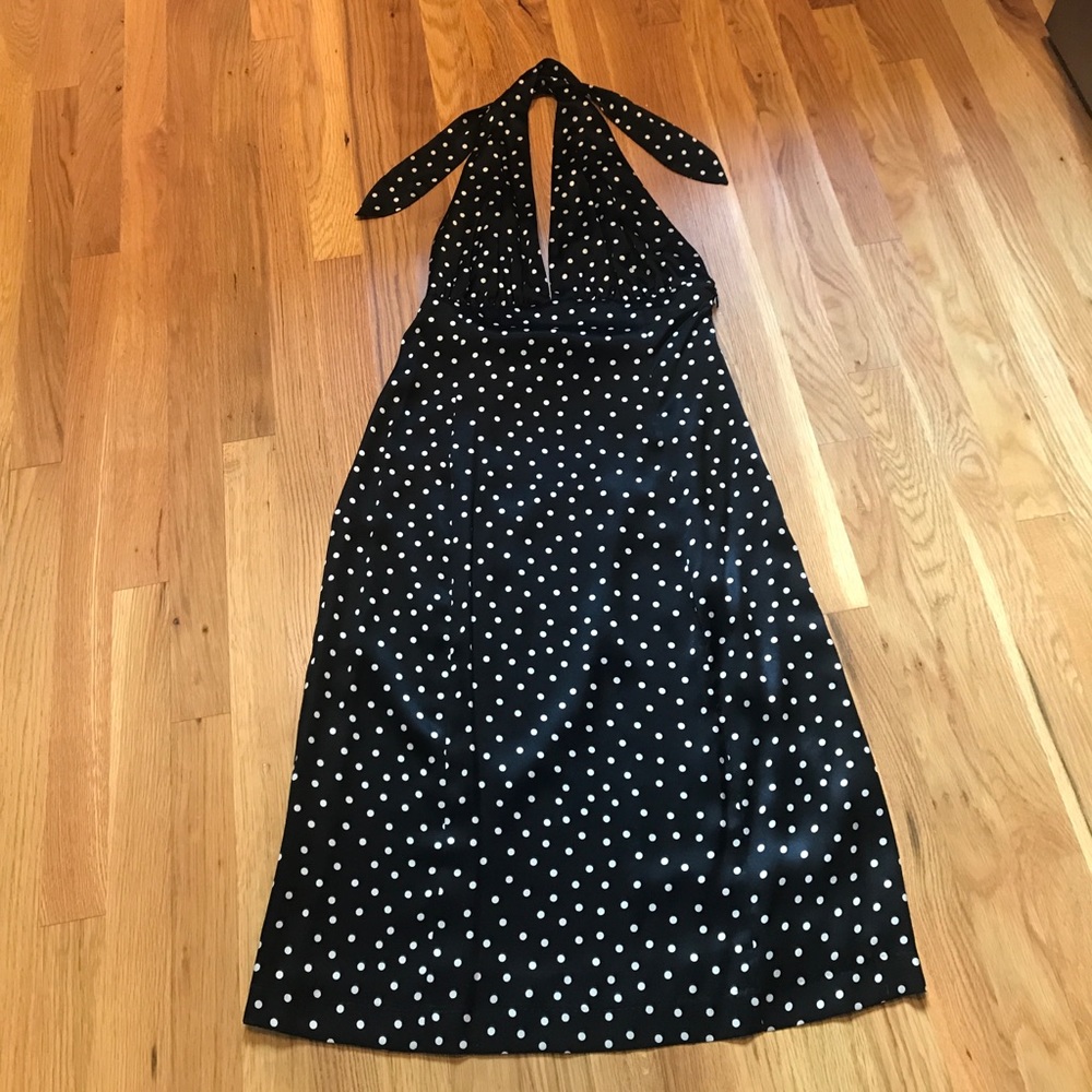 Silk black halter dress with white polka dots.