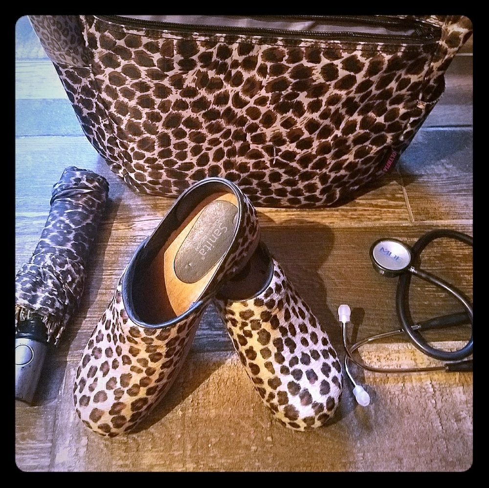 Sold Sanita pony hair leopard print clogs