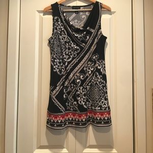 Black, white with gold and red accent color tunic