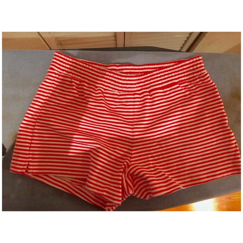 Brand new large girls pink/white striped shorts.