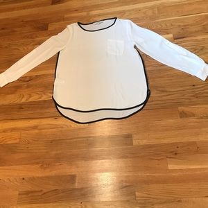 Cream color with black trim blouse