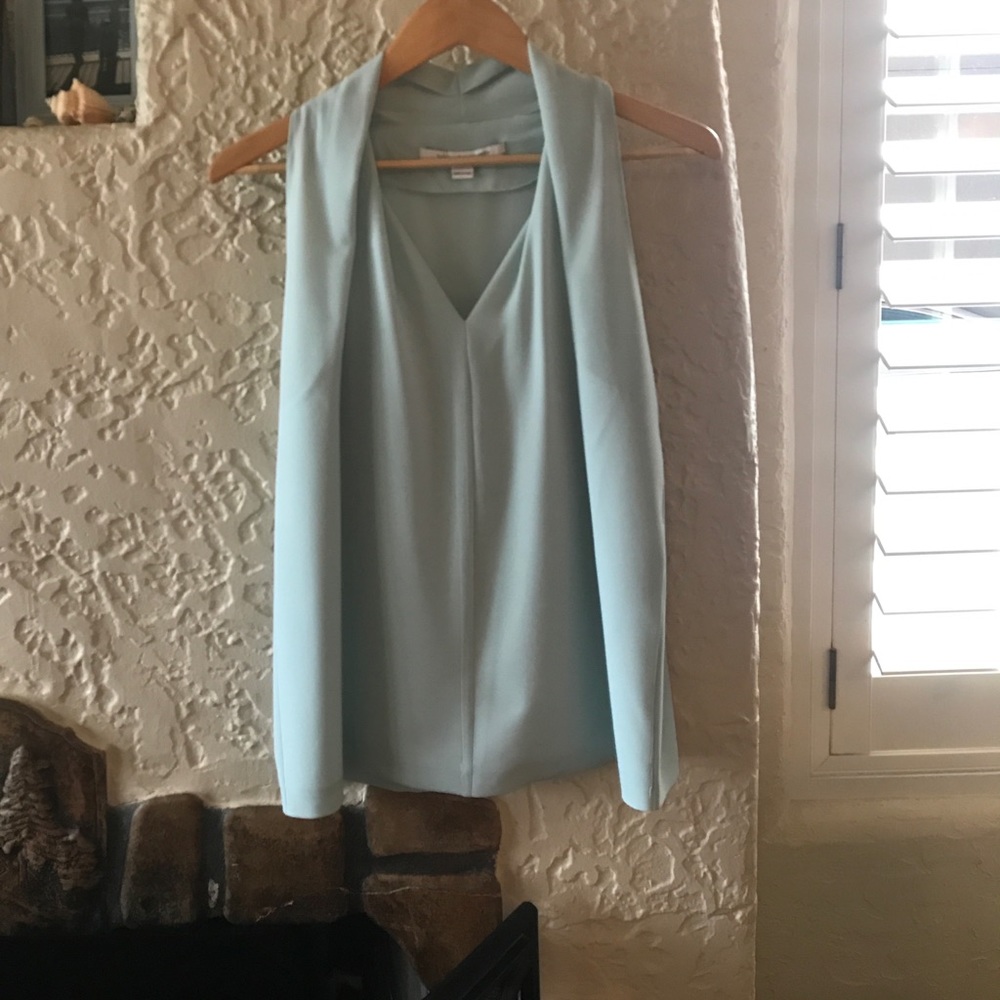 Slight halter fitting baby blue blouse