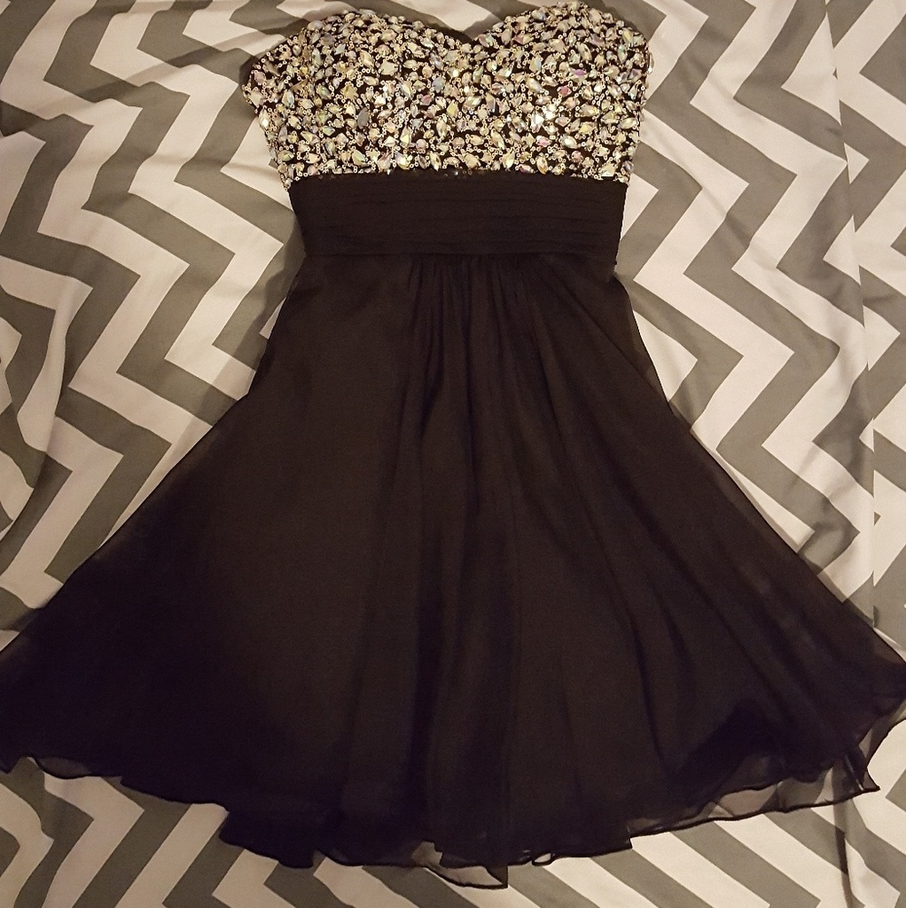 SOLD!!!!!!La Femme size 2 Black with gems.