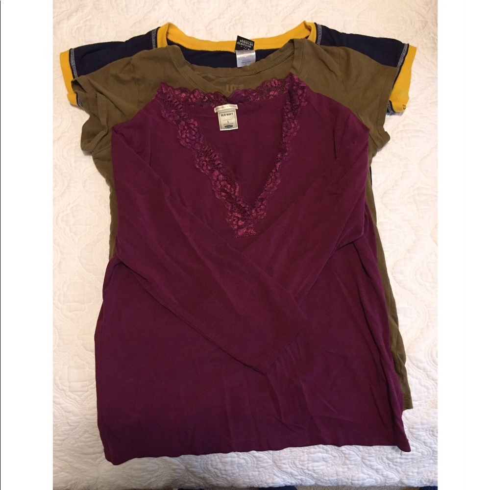 Two t shirts and a 3/4 sleeve lace top.